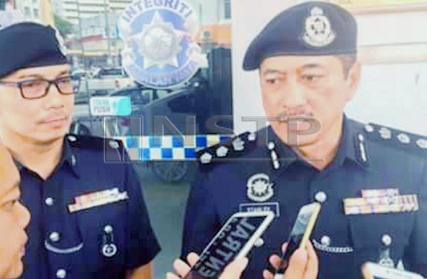 ACP Stanley Jonathan Ringgit (right)