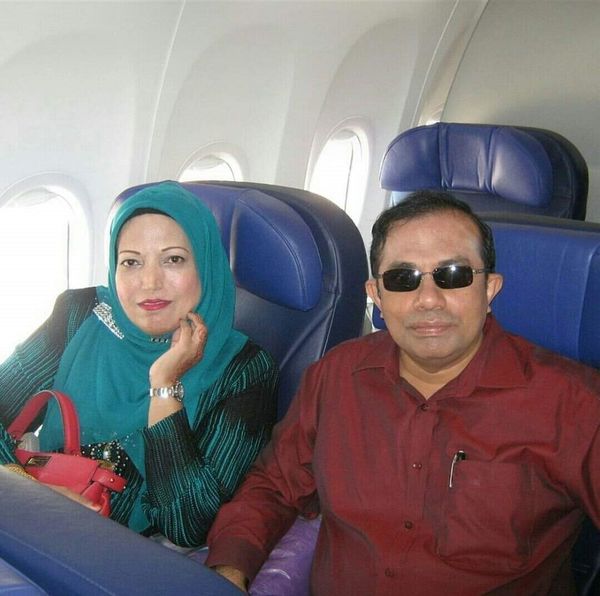 Khalidah Nazir Ahmad and her husband flying business on MAS.