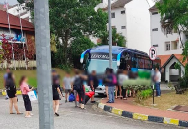 The suspects being brought to Bentong police station.
