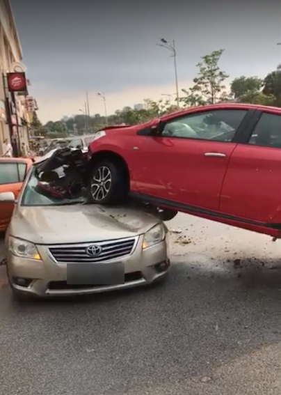 Flying Myvi Lands on TOP of Toyota Camry Outside of Atria 