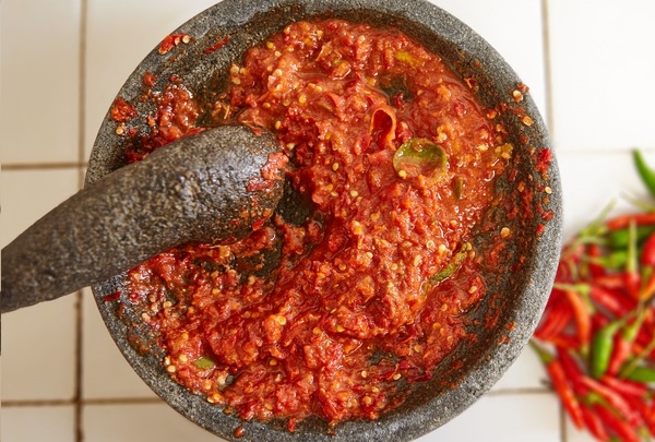 The woman was in the process of making sambal belacan. (Image for illustration purposes only.)