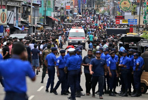 An ambulance carrying blast victims in Colombo yesterday, 21 April.