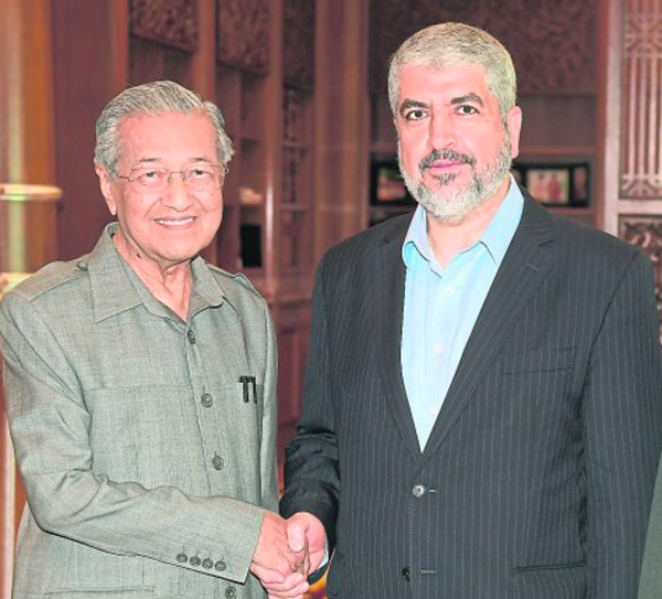 Mahathir with former Hamas chairman Khaled Mashal in Putrajaya yesterday.