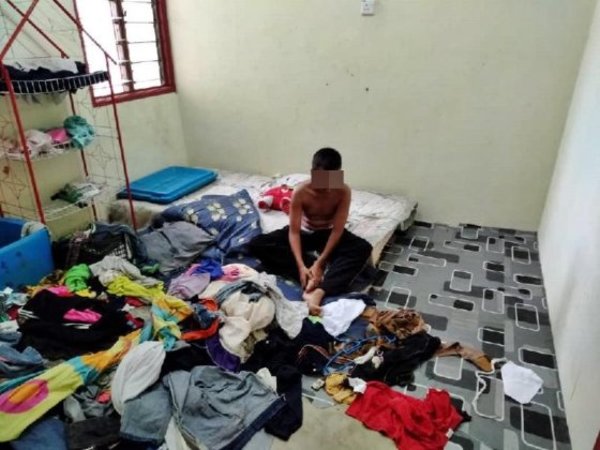 Siti's 12-year-old son found sitting in a room on 3 July.