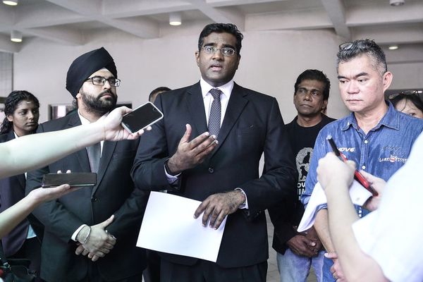 From left to right: lawyer Sachpreetraj Singh Sohanpal, lawyer Rajesh Nagarajan, and Koh Tat Meng.