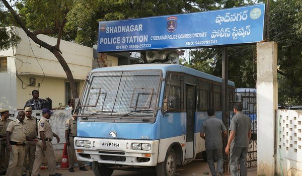 A police van carrying the four accused from a police station in Shadnagar, on the outskirts of Hyderabad.