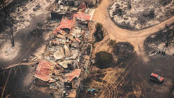 Property damaged by the East Gippsland fires in Sarsfield, Victoria on 1 January.