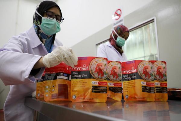 Mychef worker at a halal food factory in Kuala Lumpur.