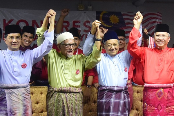 Azmin Ali, Abdul Hadi Awang, Dr Mahathir, and Annuar Musa at the Malay Dignity Congress in October last year.