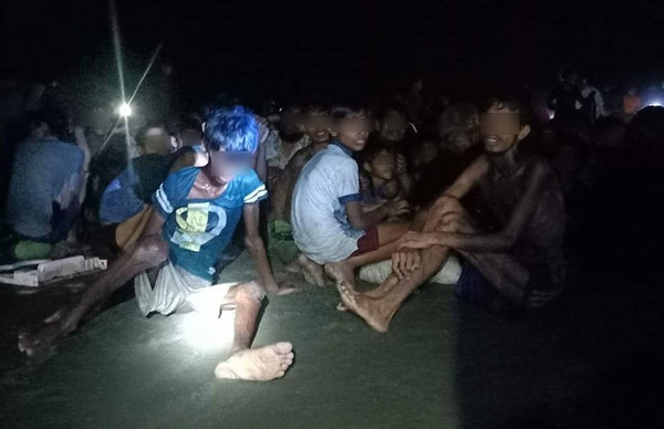 Rohingya refugees who were rescued by Bangladesh Coast Guard in Teknaf Upazila of Cox's Bazar on Wednesday.