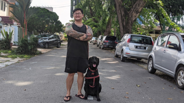 Joe Choong with his best bud, Buddy.