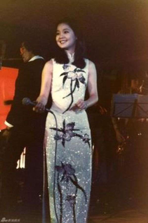 A young Teresa Teng performing at an unnamed location.