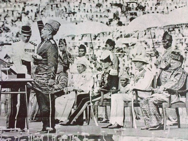 Tunku Abdul Rahman proclaiming the country's independence from British rule at Stadium Merdeka on 31 August 1957.