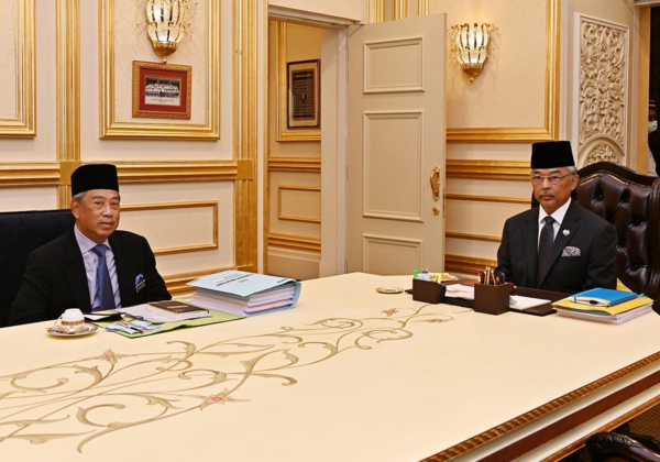 Yang di-Pertuan Agong Sultan Abdullah Sultan Ahmad Shah with Prime Minister Tan Sri Muhyiddin Yassin during a pre-cabinet meeting at Istana Negara on 21 October.