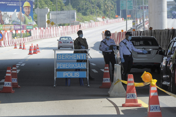 Image of an MCO roadblock used for illustration purposes only.