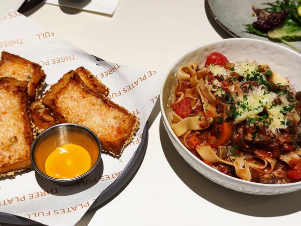 Prawn toast and NZ lamb ragyu pasta.