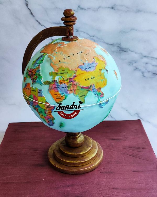 Rotating gravity globe cake.