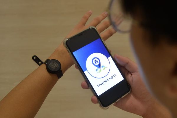 All incoming travellers to Singapore are required to wear an electronic wristband to track their whereabouts during home quarantine.