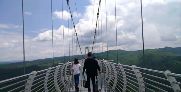 Piyan Mountain resort bridge during much calmer weather conditions.