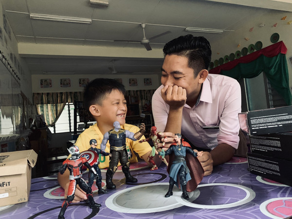 Cikgu Nazmi is a fan of comic books and a figurine collector himself.