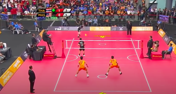 The Malaysian Sepak Takraw team playing at the men's double event.