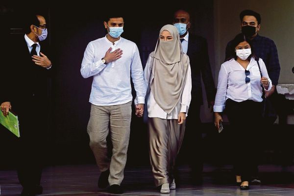 Neelofa and her husband, PU Riz, at the Seremban Magistrate's Court on Thursday, 20 May.