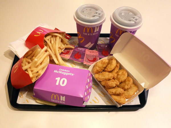 The 'BTS Meal' comes with 10 pieces of Chicken McNuggets, a Coke, Medium Fries, and two exclusive sauces.
