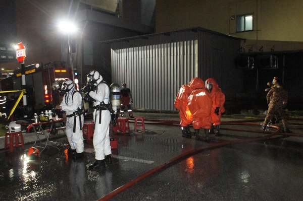 Firefighters working at the scene of the oxygen gas leak at HKL's engineering block.