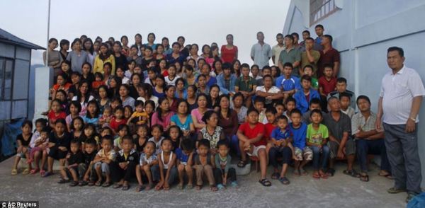 Ziona and his family pictured at their home in Mizoram, Northeast India.