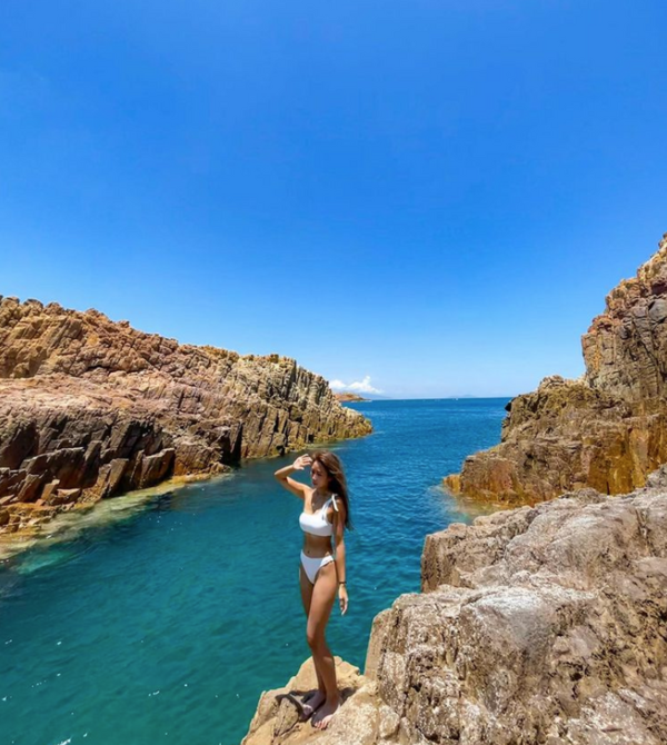 A photo of Cheung standing on a cliff in Ung Kong Islands, Wang Chau on 17 May.