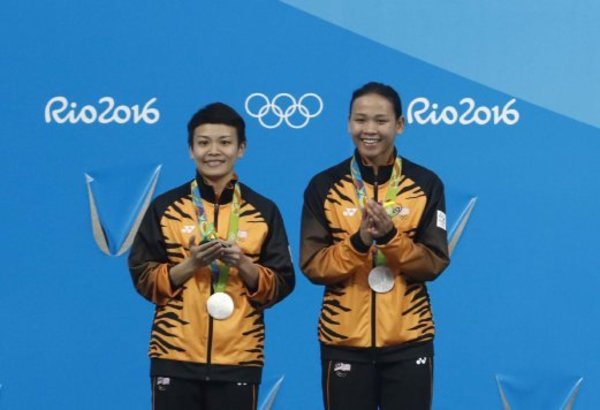 National divers Cheong Jun Hoong and Pandalela Rinong after coming in second at Rio 2016. They will not be defending their synchronised 10m platform silver medal as a pair at Tokyo, as Pandalela has been paired with veteran Leong Mun Yee.