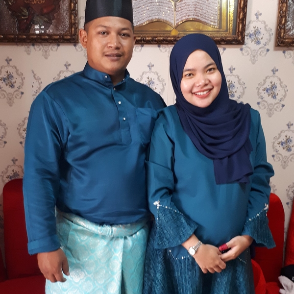 The owner of Bakeries Baker n Pastries, Nur Rasziah Fhasyarini Sharolanuar, along with her husband.