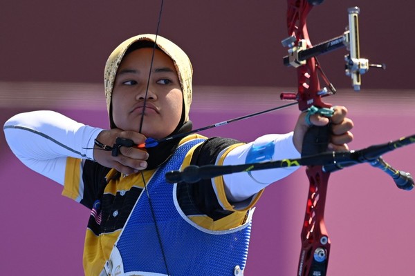 The only other Malaysian archer at the Olympics, 20-year-old Syaqiera Mashayikh.