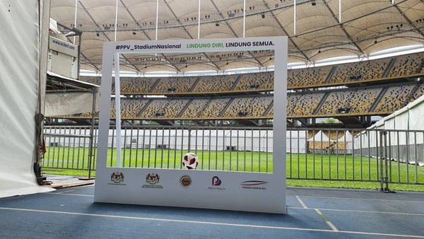 A key component of Malaysia's rapid COVID-19 vaccine roll-out is the opening of large scale vaccination centres, like this one at the Bukit Jalil National Stadium.