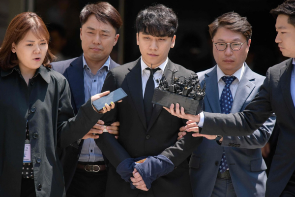 Lee (centre) speaking outside the High Court in Seoul, South Korea in May 2019.