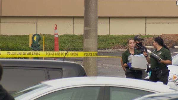 A scene outside the victim's home in Florida.