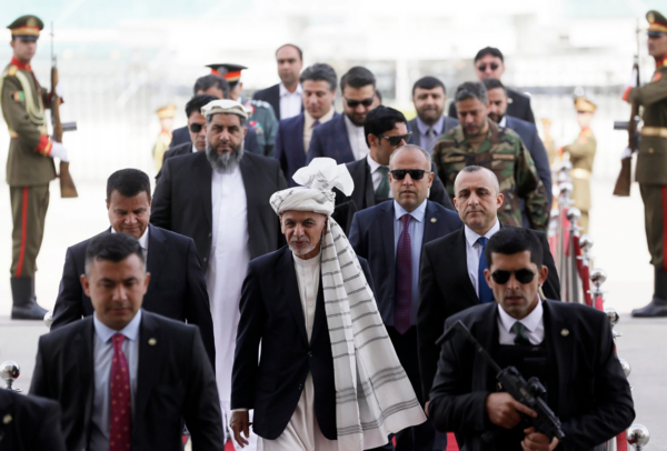 Afghan President Ashraf Ghani (centre) arriving at the Parliament in March 2021.