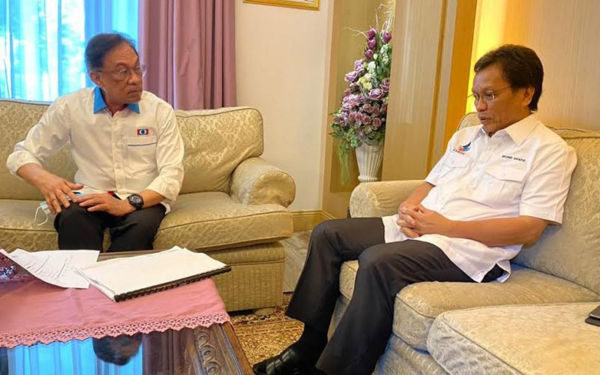 PRK president Datuk Seri Anwar Ibrahim (left) and Warisan president Datuk Seri Shafie Apdal.