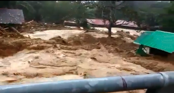 Heavy flooding was seen sweeping into kampung homes, uprooting much of the surrounding greenery.