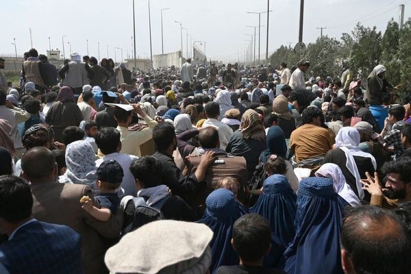 Thousands of people have been trying to flee the country with huge crowds gathering outside the airport.