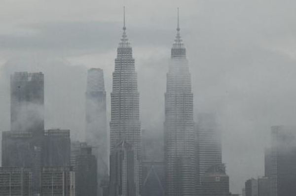 A cloudy view of the Petronas Twin Towers taken on Thursday, 19 August.