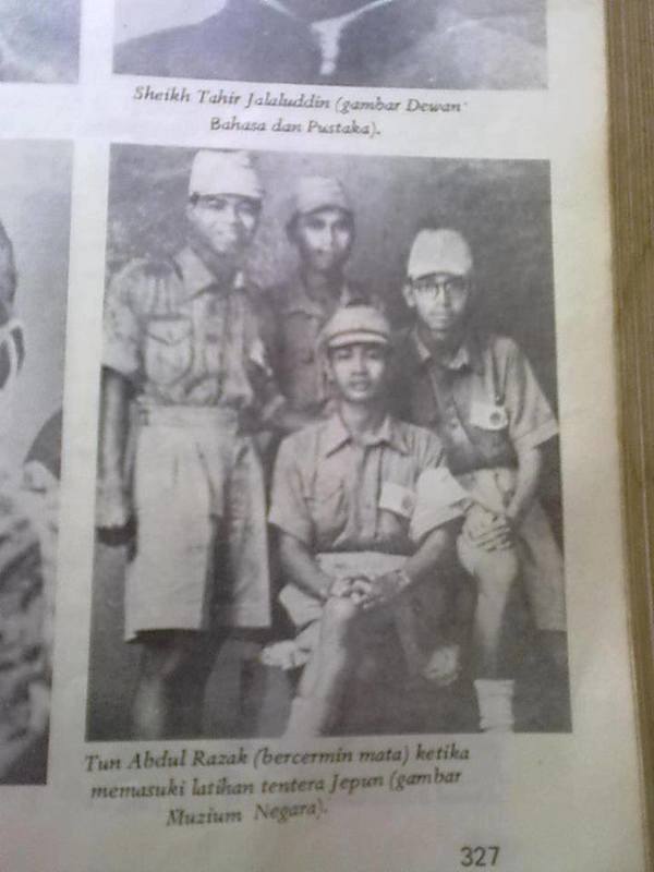 Tun Abdul Razak (in spectacles) when he was working undercover by joining the Japanese military training.