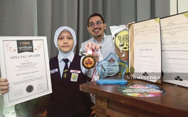 Maryam with her father Dr Muzamir Hasan.