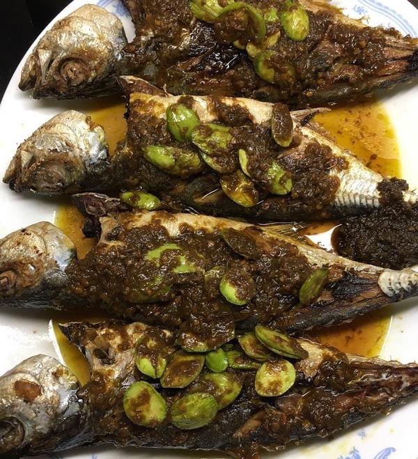 Deep fried cencaru fish with petai and cili padi paste.