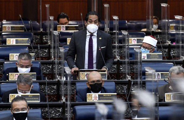 Health Minister Khairy Jamaluddin (standing).