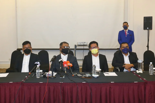 From left to right: Datuk Norhizam Hassan Baktee, Datuk Seri Idris Haron, Datuk Noor Effandi Ahmad, and Datuk Nor Azman Hassan speaking at a press conference yesterday, 4 October.