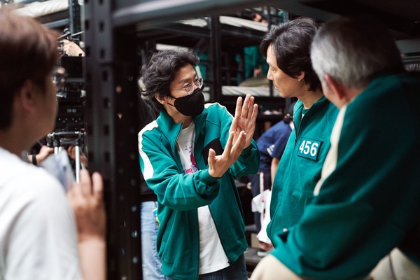 Director Hwang Dong-hyuk with lead actor Lee Jung-jae on set.