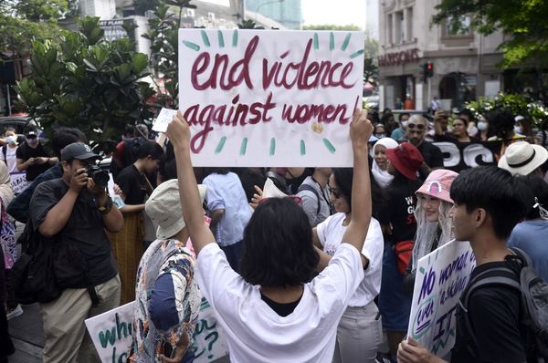 A participant holding a placard at the Kuala Lumpur Women’s March in March 2020.