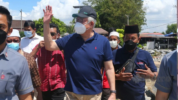 Najib visiting a fishing jetty base at Tanjung Kling, Melaka earlier this year.