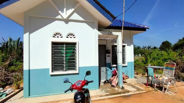 The house in Kampung Baru Pasir Penambang, where both the suspect and the victim lived.